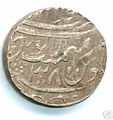 (===Description=== A silver ashrafi issued by Asif ud-Daulah from the Najibabad mint in AH 1211 (1796/7), regnal year 38. ===Source=== http://ftp.kermit-project.org/itc/mealac/pritchett/00routesdata/1700_1799/avadh_early/asifuddaulah/asifuddaulah.html)