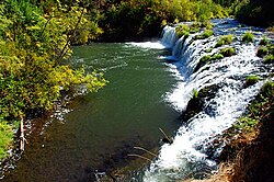 Big Butte Creek Falls, the city's namesake, located on the South Fork of Big Butte Creek