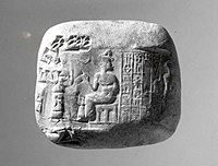 Cuneiform tablet impressed with cylinder seal. Receipt of goats, c. 2040 BC, year 7 of Amar-Sin. Neo-Sumerian.[37]