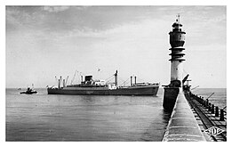 Vieille carte postale sur laquelle apparaissent les rails posés sur la jetée (Patrick Maire / phare-et-feux.fr).