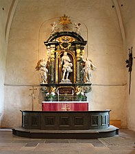 Altare och altaruppsats i Hammarby kyrka i Uppland. Altaruppsatsen är tillverkad 1704 och troligen skuren av Caspar Schröder.