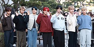Seven boys standing