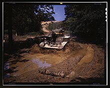 An M3 going through water obstacle, Ft. Knox, Ky.