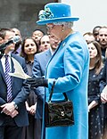 Queen Elizabeth II with a Launer handbag