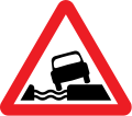 Water course alongside road