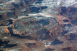 Oblique air photo facing southeast from about 30,000 ft.