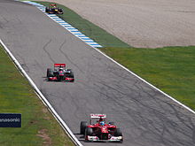 Photographie de Fernando Alonso, Jenson Button et Sebastian Vettel au Grand Prix de Grande-Bretagne