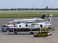 Un Embraer 145 in livrea Team Lufthansa dietro ad un Dornier Do 328 della Cirrus Airlines