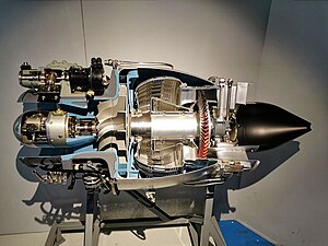 Turbomeca Marboré IV engine showing location of leakage between impeller blades and stationary shroud, shown sectioned and painted blue. This is the leak path for a centrifugal impeller equivalent to an axial blade tip to casing clearance.[118]