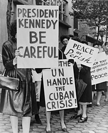 Women holding signs during the Cuban missile crisis