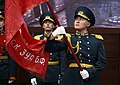 An honour guard holding the Banner of Victory.