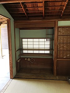 Center, kake-shōji. Right, opaque ajiro (網代: "wickerwork") on a cupboard door.[6]