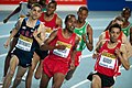 Abdalaati Iguider (far right) en route to victory in the 1500 metres.