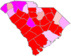 Red counties were won by Moses and magenta counties were won by Tomlinson