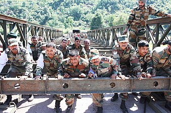 Army personnel building a bridge over Poonch River to re-establish connectivity in Poonch during September 2014.