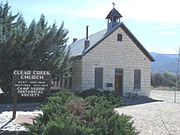 The Clear Creek Church was built in 1898 and is located on Clear Creek Road 3.5 mi. SE of Camp Verde. The builders placed in the cornerstone of the building a bible and a $5 gold piece (which was chiseled away in the 1920s). It was Camp Verde’s only church until 1913, when it was transformed into the city’s one-room schoolhouse. In 1946, the church was abandoned. Today Clear Creek Church is looked after by the Camp Verde Historical Society. It was listed in the National Register of Historic Places on August 6, 1975, reference #75000362.[12]