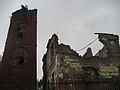 Damaged tower and destroyed Baroque palace, before renovation