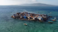 Vista di Caye Sable dal drone con l'Isola de la Gonâve sullo sfondo