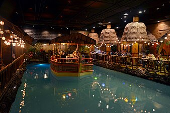 A boat with the band in the pool of the Tonga Room and Hurricane Bar
