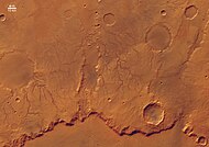 The eastern rim of Huygens with dendritic channels leading away from the rim.