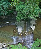 Water falling over the shale creek bed in Euclid Creek Reservation