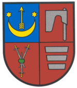 Symbol of Olesko. 1 Sas, 2 Topór, 3 Herburt, 4 Korczak. Coat of arms of Jan Daniłowicz h. Sas (landowner in 1605), from his mother Katarzyna Tarło/wa h. Topór, and his grandmothers Katarzyna Odnowski/a h. Herburt, and Regina Malczycki/a h. Korczak.[1]