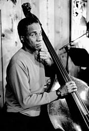 A man playing a double bass