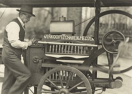 Scissors grinder with "Dutch grinding cart" in Amsterdam, c. 1930