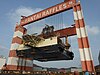 The Taisun crane at the Yantai Raffles Shipyard holds the 17,100 metric ton deck box of Scarabeo 9 in the air as the barge is moved out from underneath.