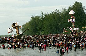 Tabuiks being lowered into the sea in Pariaman, Indonesia.
