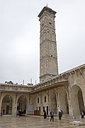 The minaret of the Great Mosque of Aleppo (prior to its destruction in 2013), built circa 1090 during the Great Seljuk period[116]