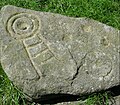 cup and ring marks created by archaeologists with a deer antler pick[48]