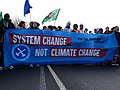 Banner with the message: "System change not climate change"