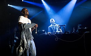 Freddie Gibbs (left) and Madlib performing live in March 2014