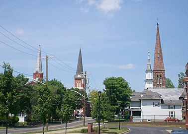 Four churches at the main intersection in Palmyra, New York in 2010. The village claims it is the only such occurrance in the world.