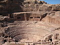 Image 15 The "Theatre" at Petra Photo: Douglas Perkins Petra is an archaeological site in Jordan, lying in a basin among the mountains which form the eastern flank of Wadi Araba, the great valley running from the Dead Sea to the Gulf of Aqaba. It is famous for having many stone structures carved into the rock. More featured pictures