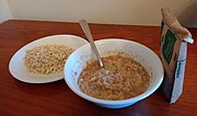 Quaker-brand single-serving flavoured "instant" oatmeal packet to make a quick oat porridge