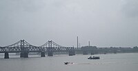 The Sino–Korean Friendship Bridge across the Yalu (Amnokgang) linking Sinuiju and Dandong.