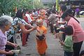 Image 72Buddhist novices receiving joss sticks. (from Culture of Thailand)