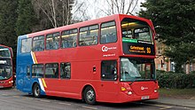 Red double decker bus with display "Gateshead 93".
