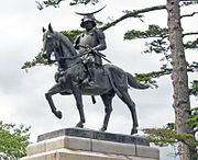 A modern equestrian statue of Masamune at Sendai Castle.