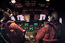 A view of the commander and pilot during reentry on STS-42