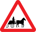 Horse-drawn vehicles likely to be in the road