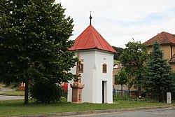 Belfry and cross in the centre of Závist