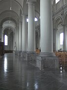 The north aisle and tuscan columns, towards the choir