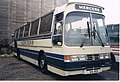 Duple Goldliner IV on Leyland Tiger chassis, with the alternative roof profile incorporating a destination/name display over the windscreen and optional flat glazing.