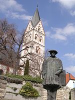 Statue of Sebastian Münster in front of St. Remigius Church, Ingelheim