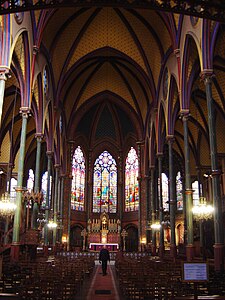 Saint-Eugene-Sainte-Cécile (1854–1855) featured a Gothic design with a modern iron framework