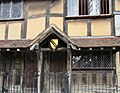 Shakespeare's Birthplace, with coat of arms displayed.