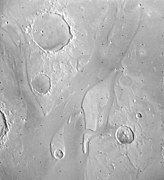 Viking Orbiter 1 image of a distal (northern) part of Tiu Valles, showing where it divides to go around the craters Lydda and Kipini.
